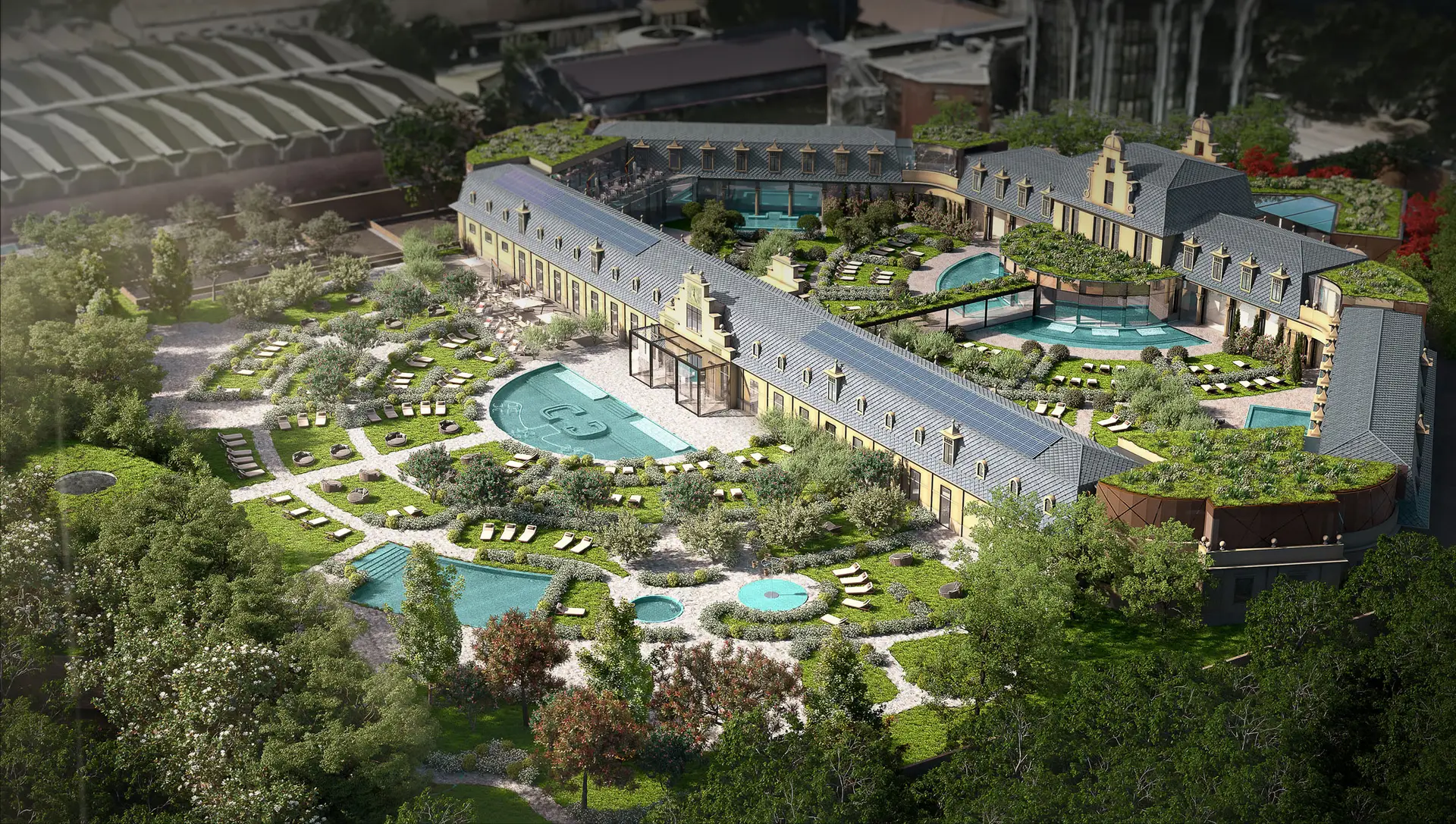 Vista aerea della spa DE MONTEL di Milano, con piscine, giardini e un lussuoso edificio. Godetevi l'esperienza termale milanese.